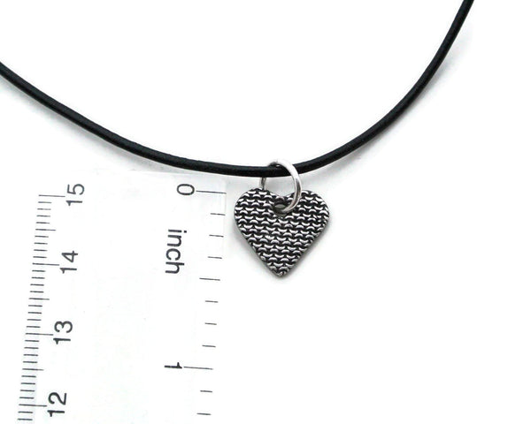 Chain mail silver heart necklace by ruler for sizer