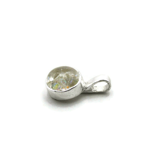 side view of dainty round memorial ash pendant