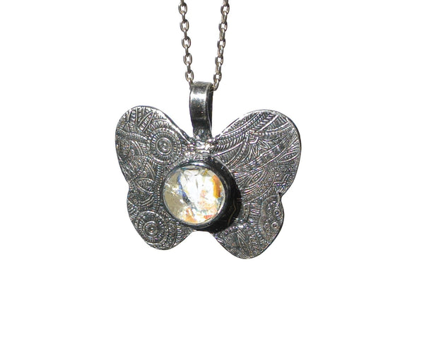 Custom handmade silver inspirational butterfly necklace side view in sunshine on sterling silver chain