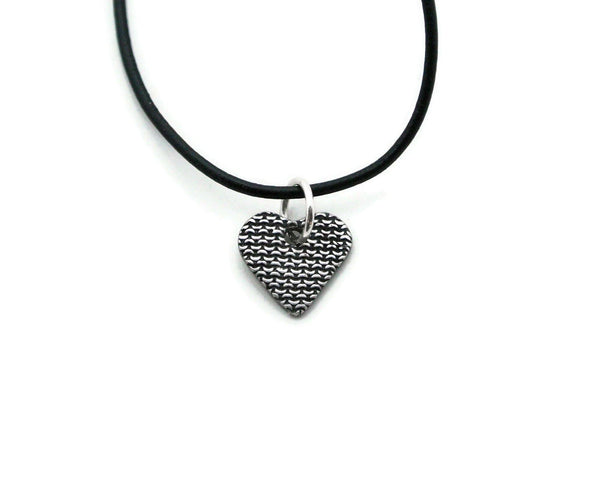 Small silver heart pendant with chain mail texture on the black leather cord necklace option