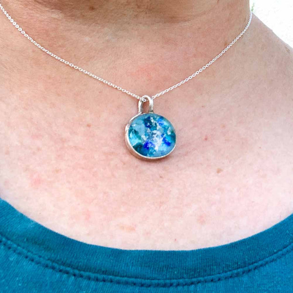 blue silver loop top statement memorial cremation glass necklace on model